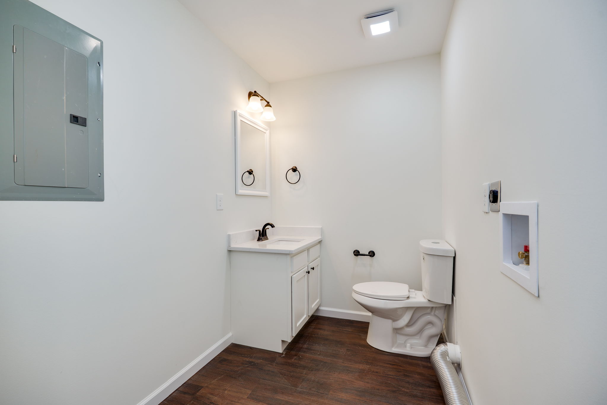 Half bath and laundry area